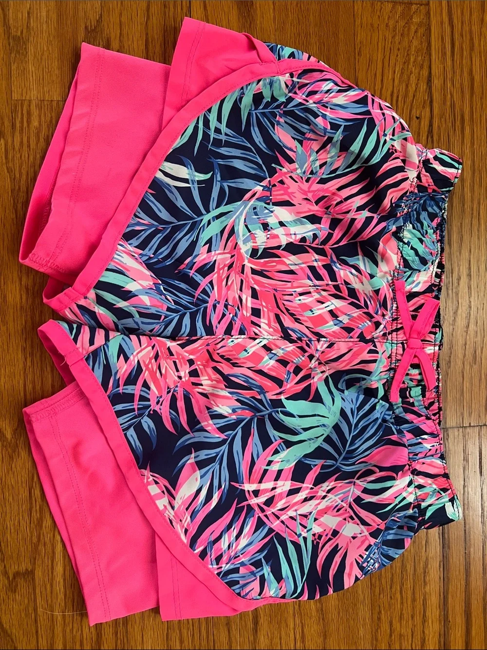 2-pack girls size small athletic shorts. 1. DSG blue pattern, 2. Oshkosh pink
